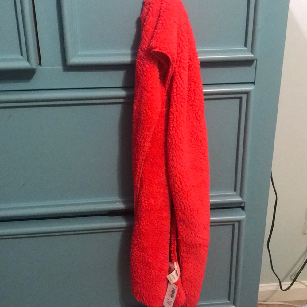 Pink, fuzzy scarf